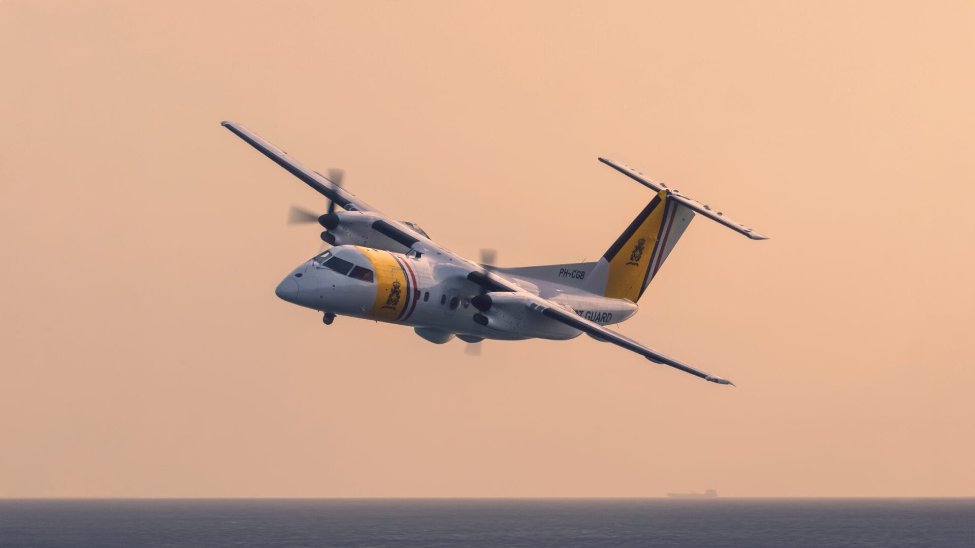 Photograph of the PH-CGB aircraft by The Dutch Caribbean Coast Guard flying at Sunrise