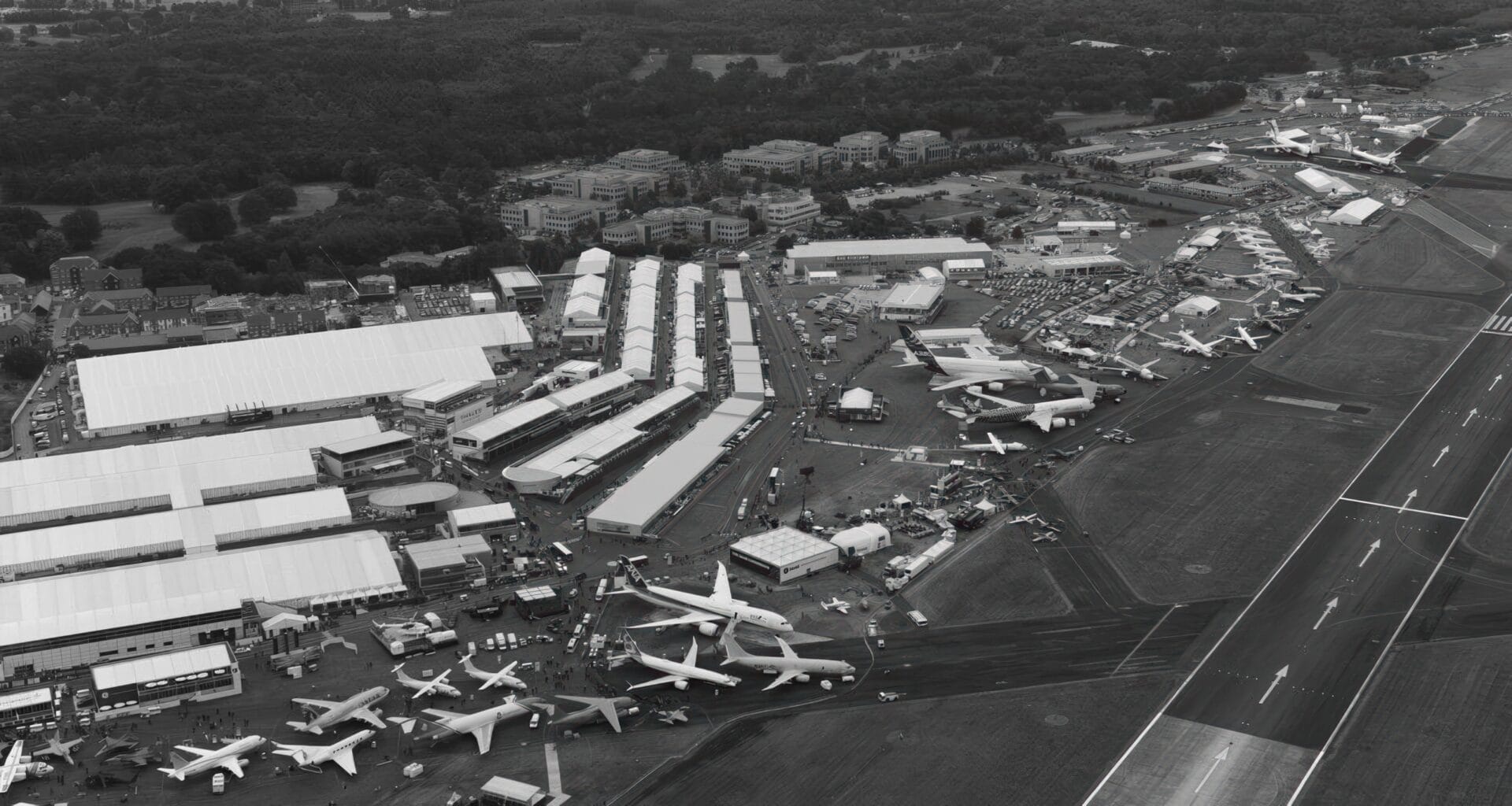 Aerial image of farnborough airport during the Farnborough airshow with airplanes on the ramp